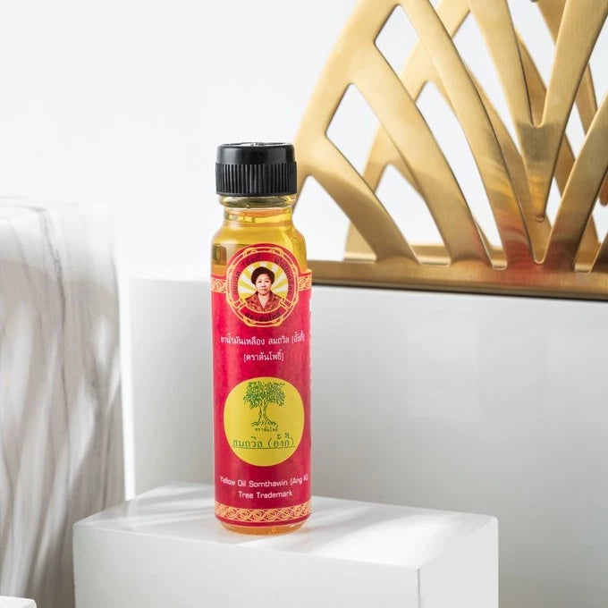 Somthawil Yellow Oil Ang Kee 24cc glass bottle packaging Thailand traditional herbal remedy for congestion aches insect bites