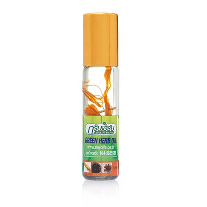 Person holding Green Herb Oil with Ginseng 8cc near nose inhaling herbal aroma