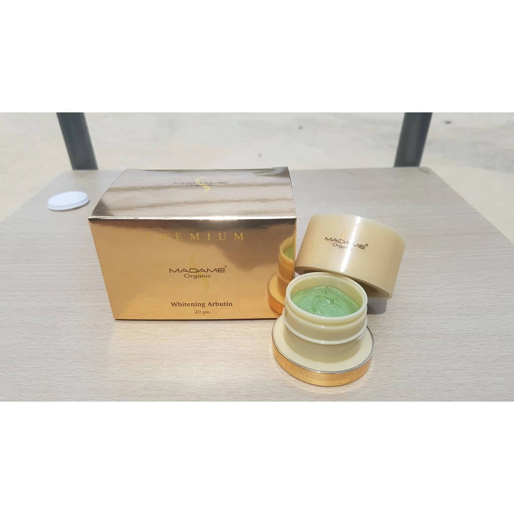 Woman applying MADAME ORGANIC Pearl Cream for radiant bright smooth glowing skin before after dark spot results
