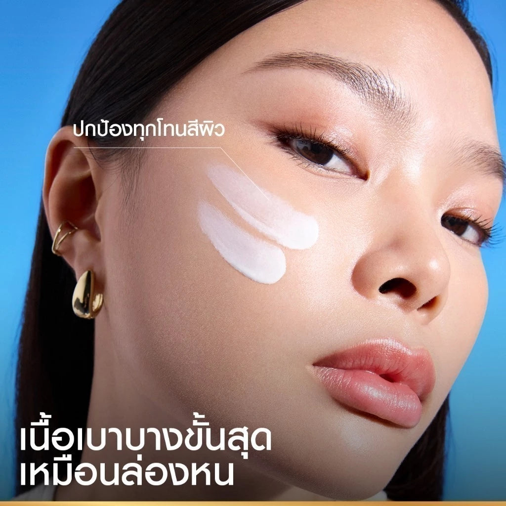Woman applying L'Oréal Paris UV Defender for protected bright radiant glowing skin before after results