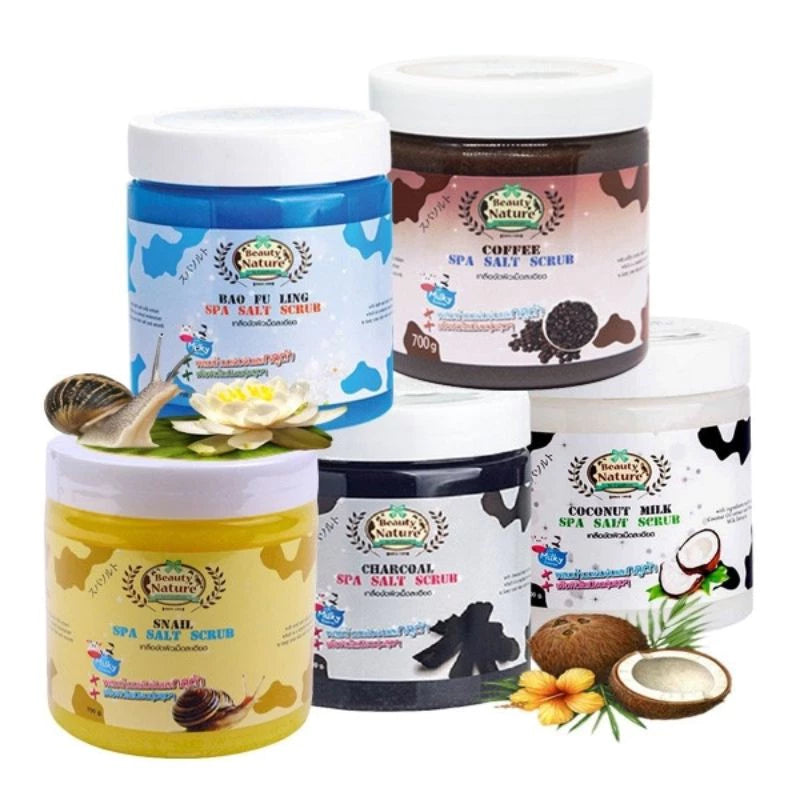 Collection of spa salt scrubs with various scents and packaging designs on a white background.