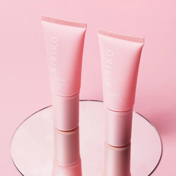 Woman applying RiRIKO Recovery Serum for smooth radiant even-toned delicate skin before after results
